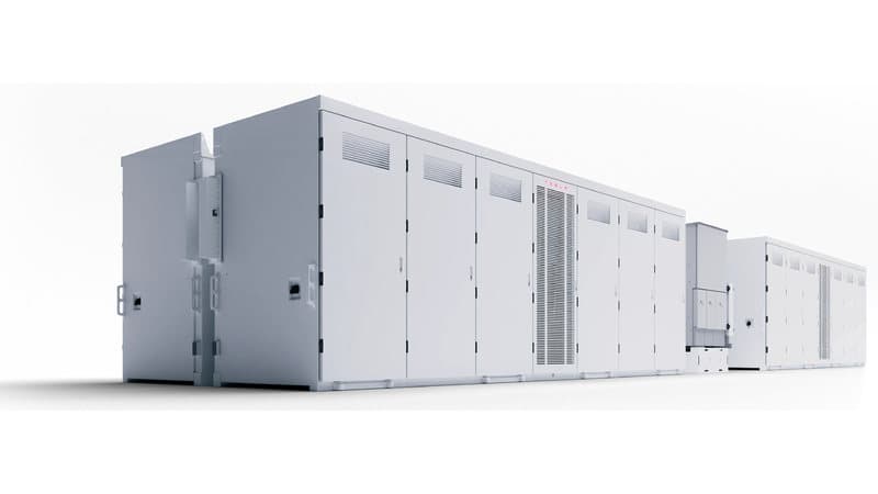 Megapack 3 units in a row with the integrated medium-voltage transformer and switchgear cabinet